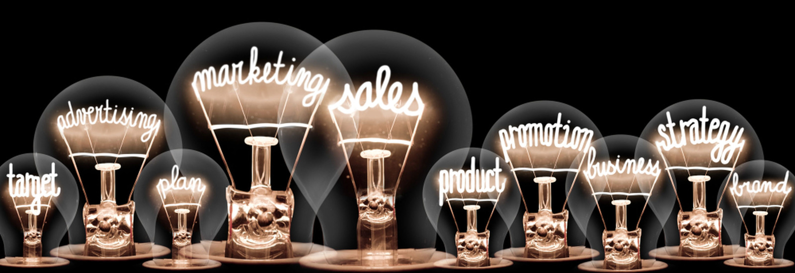 Lightbulbs Containing Key Marketing Terminology for Products, Branding, Promotions and Sales